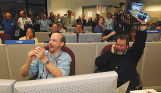 NASA scientists cheer the recent discovery.